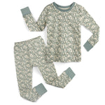 Children's pajama set with a green snake pattern on a white background