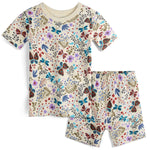 Children's pajama set with floral and butterfly pattern on a white background
