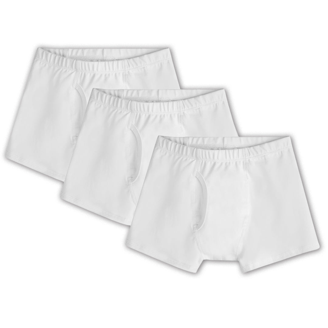 three white boys boxer briefs on a white back ground. 