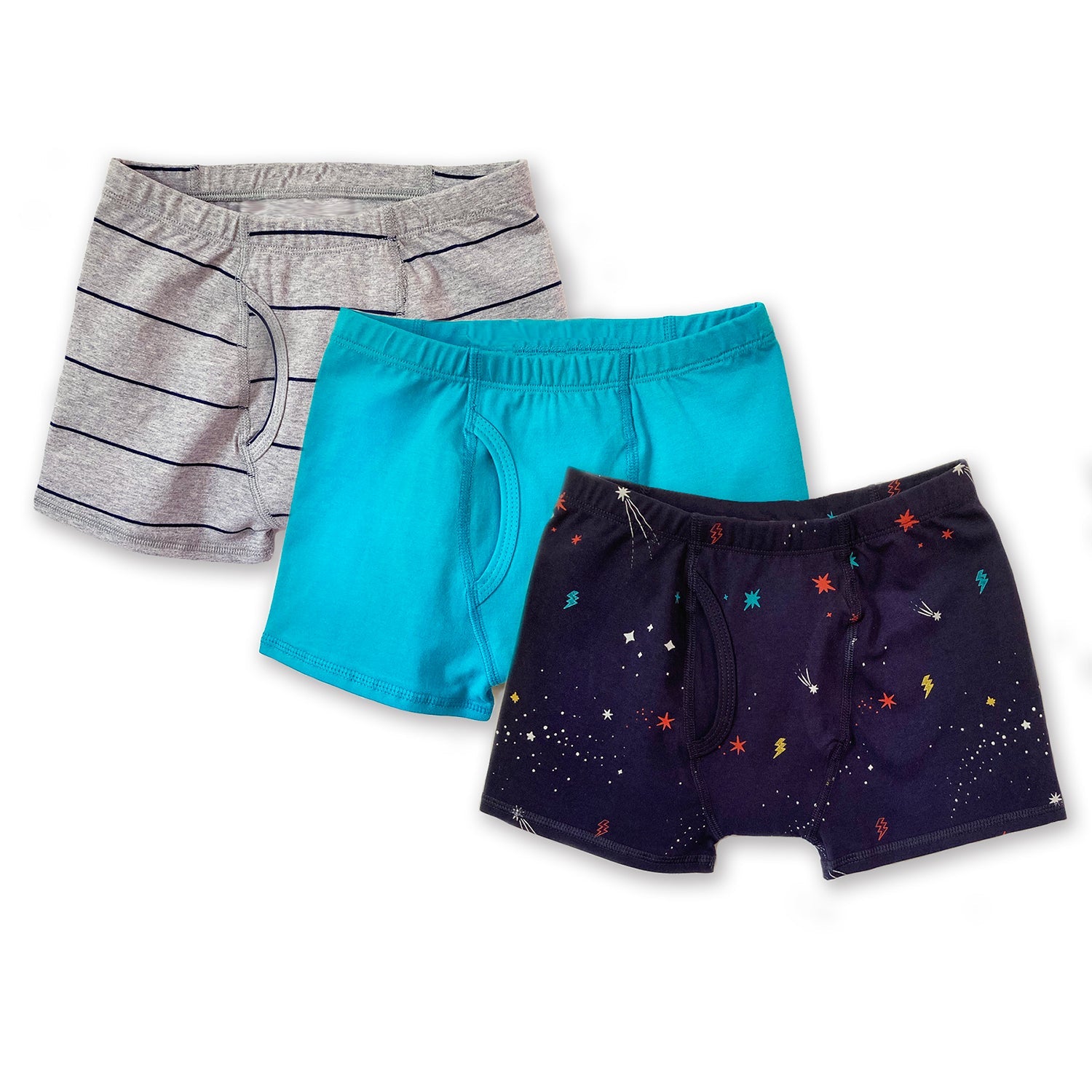 three boys boxer briefs on a white back ground. one is gray stripe, one is turquoise and one is a star print on a navy background